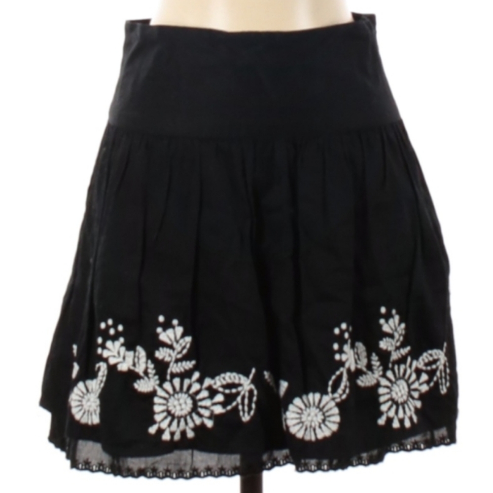 Guess Black Skirt with White Embroidered Floral design.